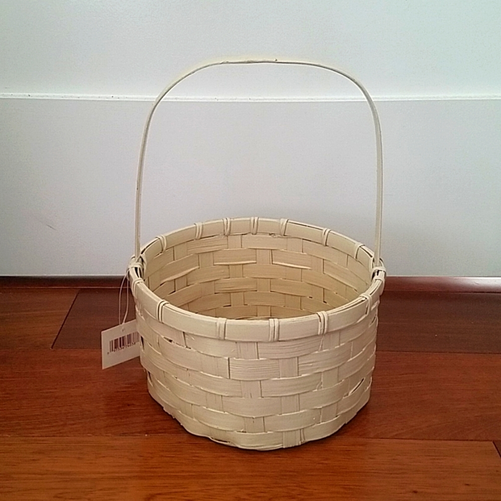 NWT Cream-colored wicker basket. One size.